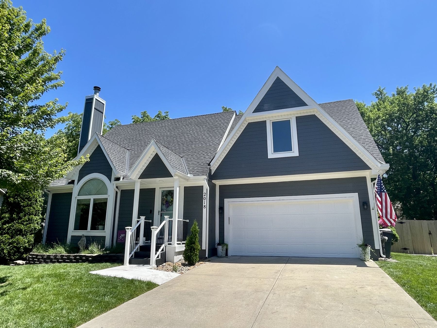 Exterior house painting in Kansas City — finished two-story home