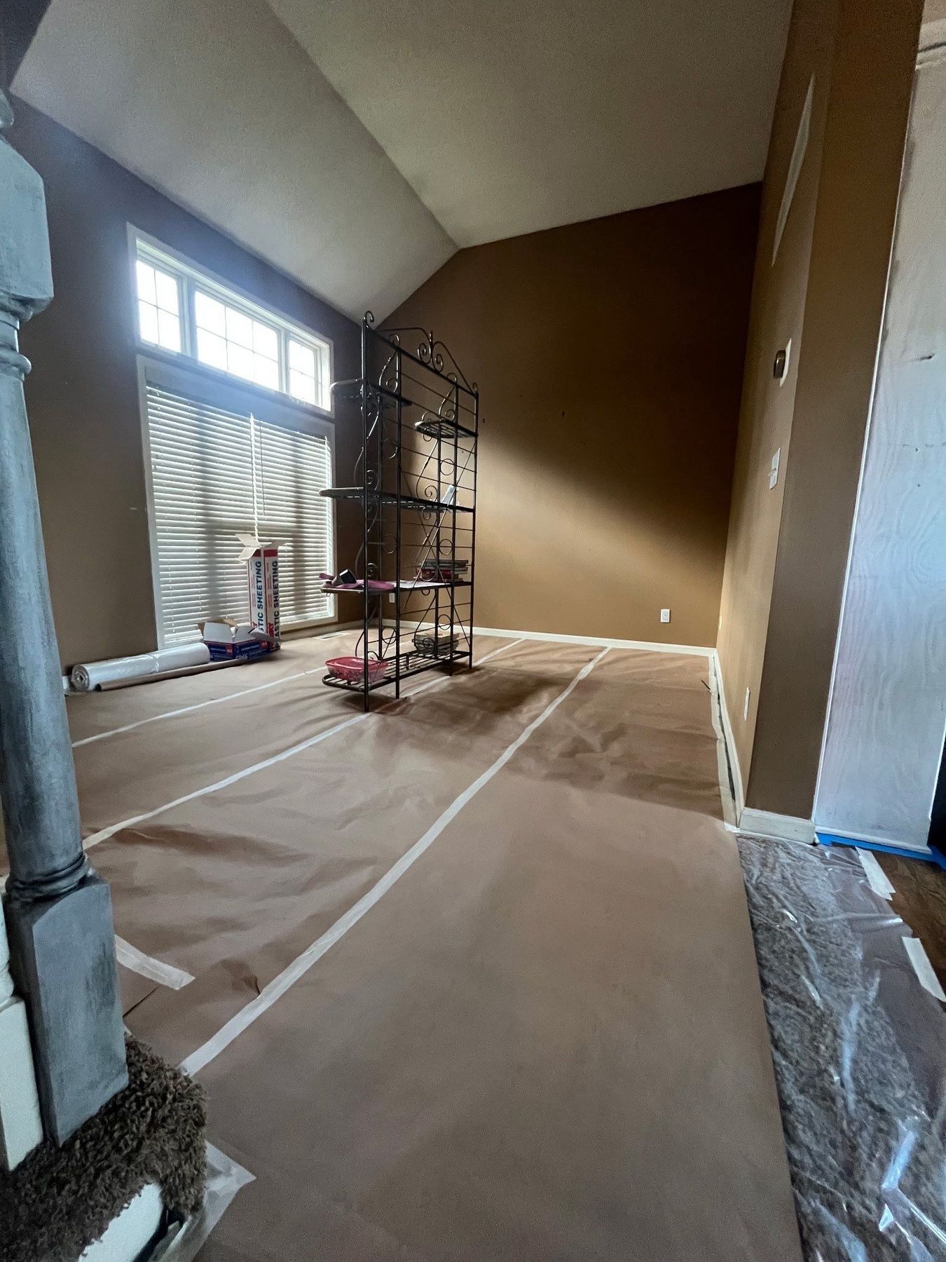 Interior prep by EverPro Painting โ floors fully covered in taped rosin paper before any painting begins