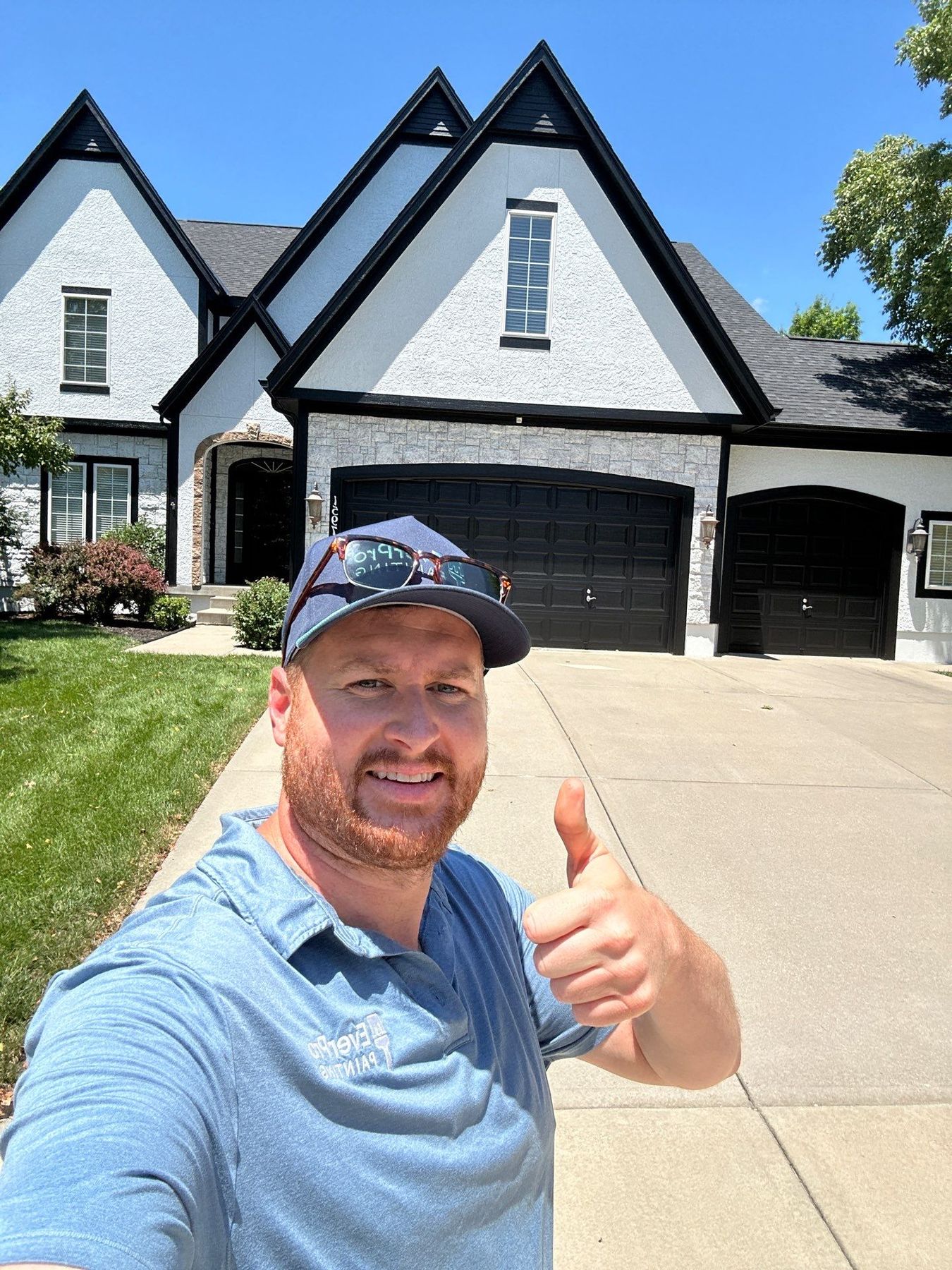 Ethan Sageser, owner of EverPro Painting, at a finished job site in Kansas City